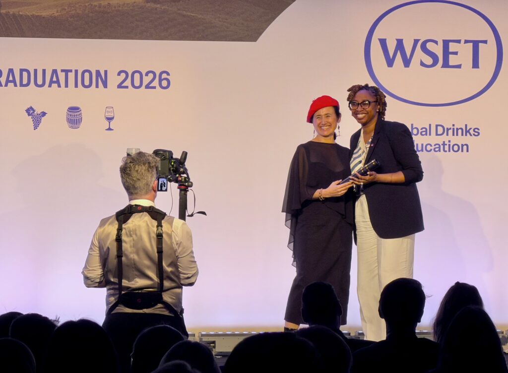 IWC Instructor Amy Wright receives her Diploma from WSET Honorary President Dr. Laura Catena on-stage at the Class of 2025 Graduation ceremony in London UK.